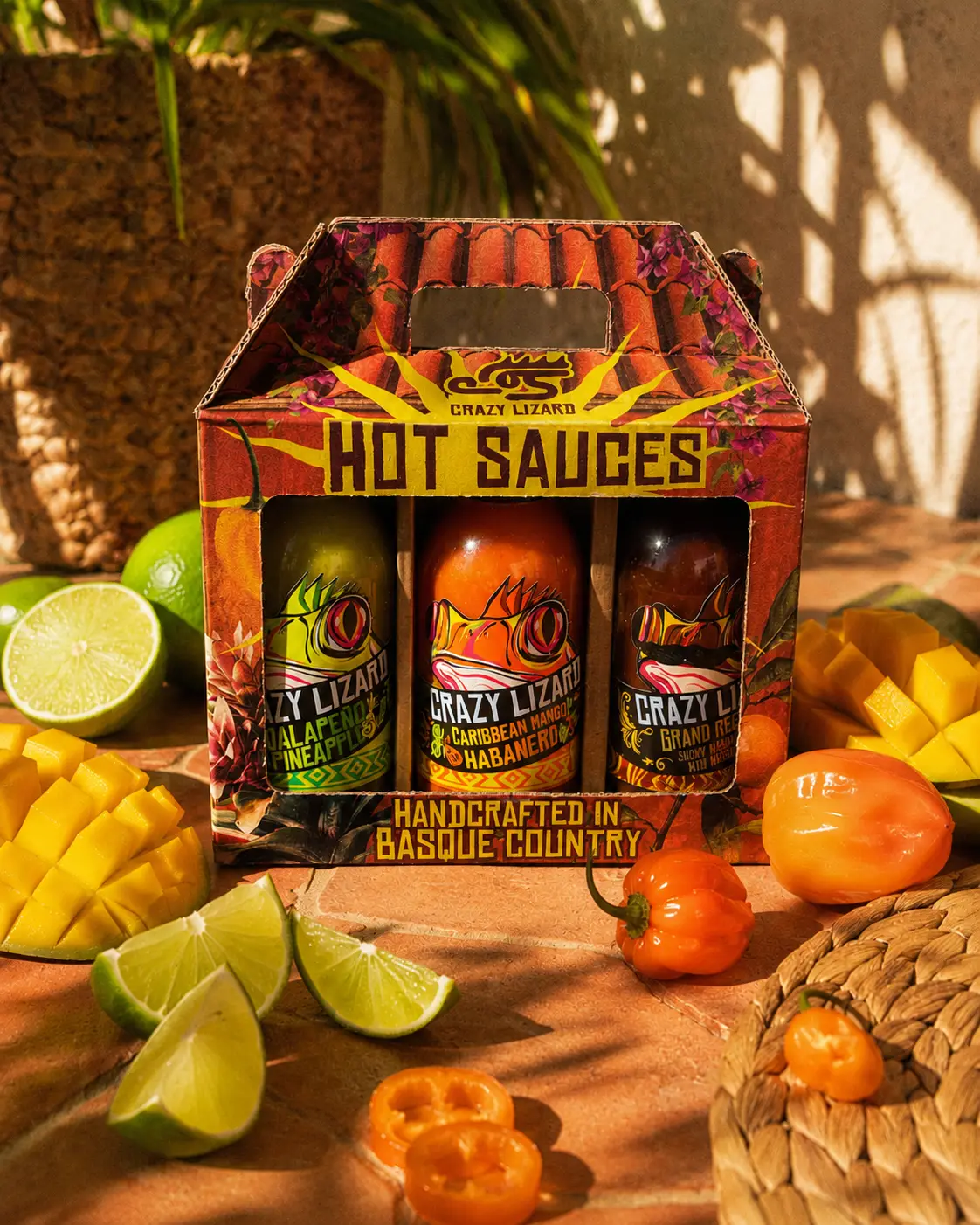 Caja Hot Sauces del Brutal Pack de Crazy Lizard con tres botellas de salsa picante, lima y mango