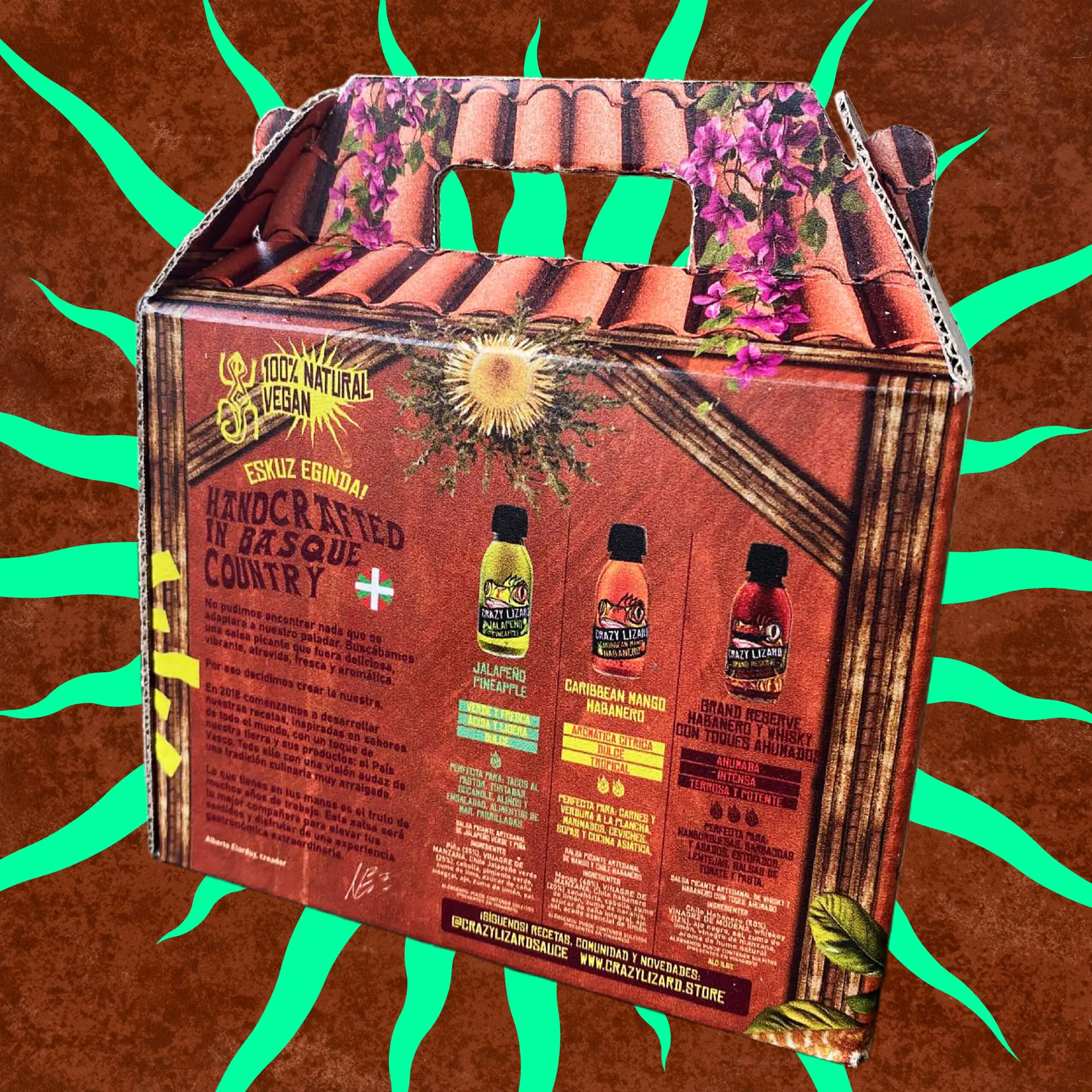 Brutal Pack de Crazy Lizard: caja de tres salsas picantes artesanales sobre fondo naranja